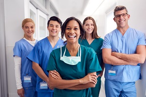 medical team smiling at camera